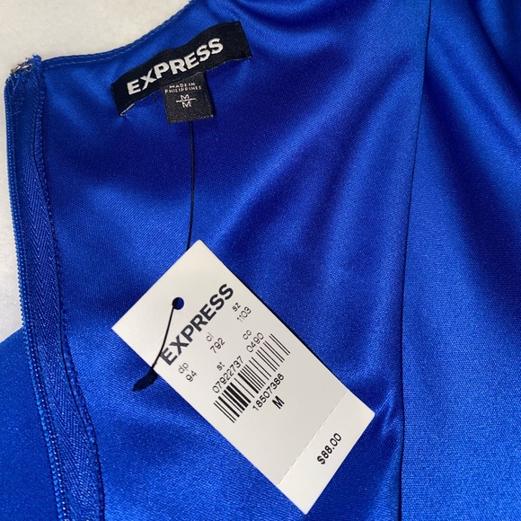 NEW WITH TAGS blue jumpsuit. Size M - Picture 2 of 3